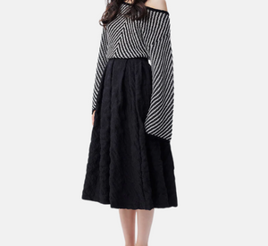 THEO - Calypso Plaid Box Pleat Midi Skirt in Black